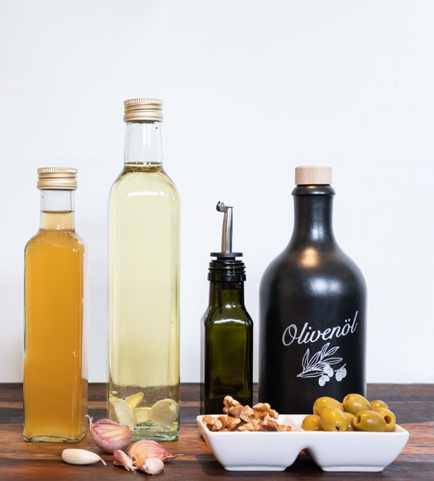 Bottiglie per l'olio di oliva - Bottiglie in vetro o acciaio - Tappo DOP o  vite